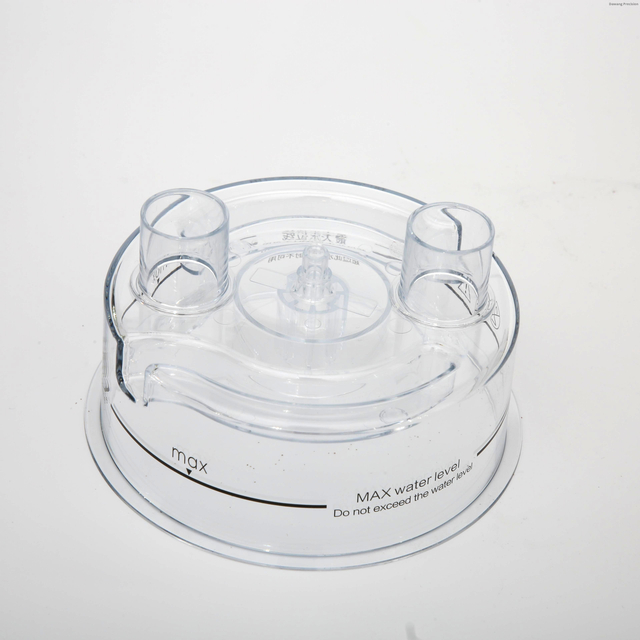 Precision injection molded transparent polycarbonate humidifier reservoir base with MAX water level markings and dual inlet ports