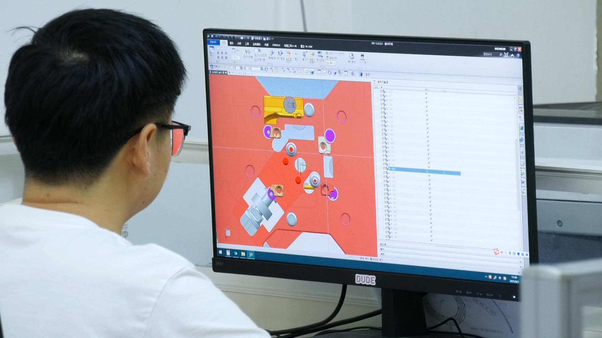 engineer reviewing mold drawings