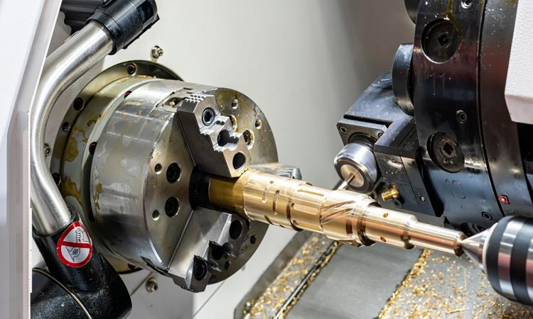 Traditional CNC turning of medical screws using chuck-supported workholding.png